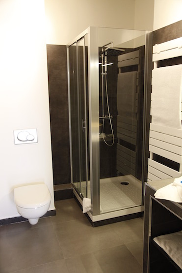 Bathroom with shower, sink and WC